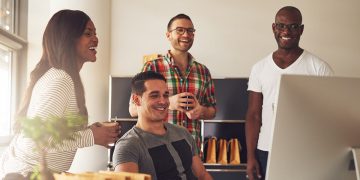 small business team looking at new website