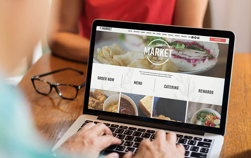 The Market website on laptop